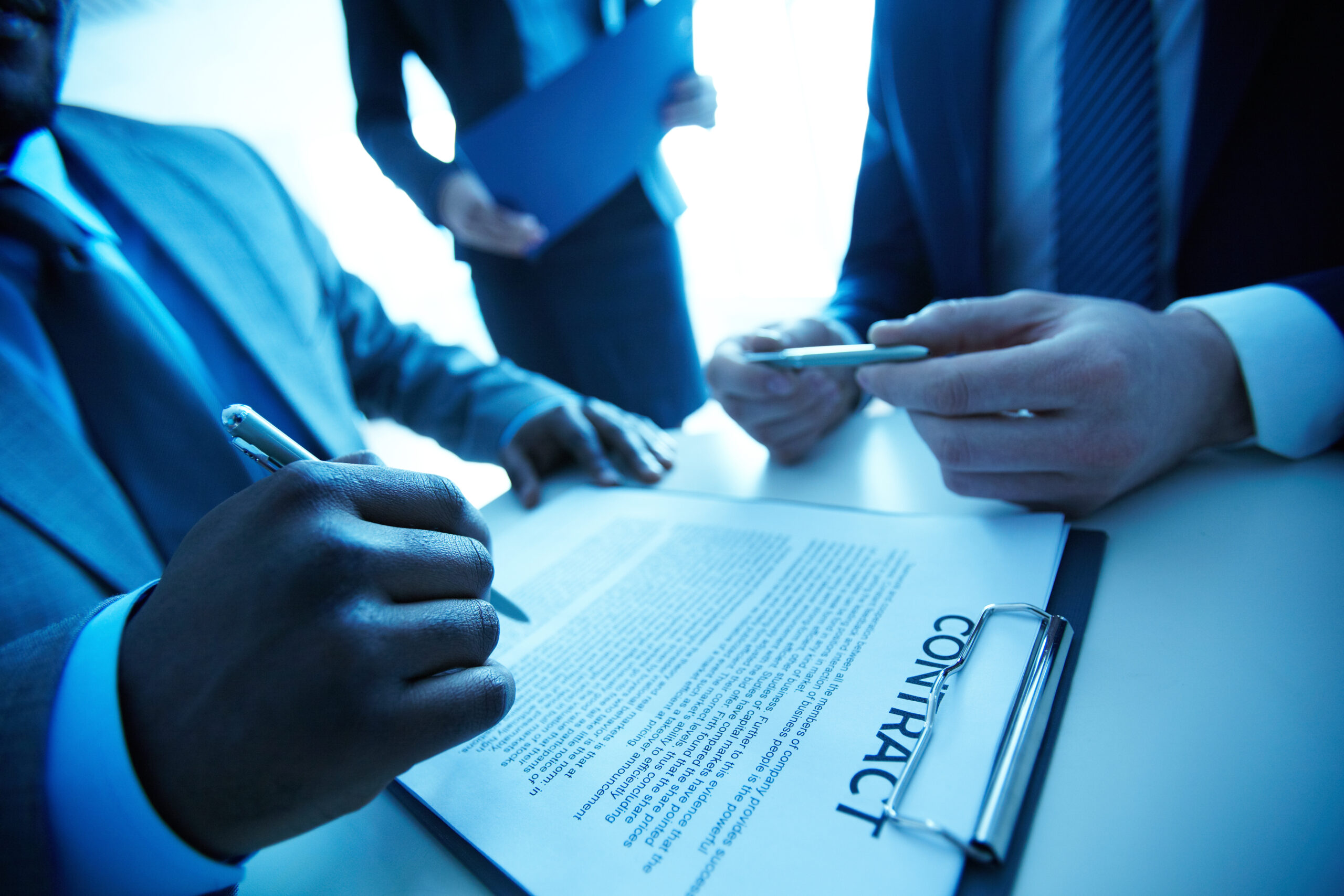 close up clipboard with contract scaled